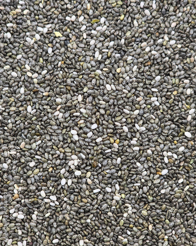 Chia seeds isolated on white background with full depth of field. Top view. Chia seeds background. Organic chia seeds food in bowl superfood light surface. Super food, healthy food concept.