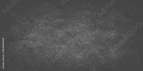 Vintage abstract grunge background featuring a dark textured stone surface with rough black and white chalk patterns on an aged gray concrete wall backdrop