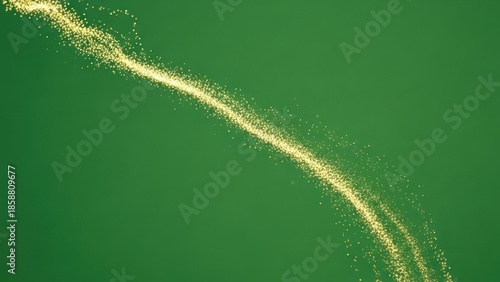 Golden glitter stream flows diagonally across a solid green background