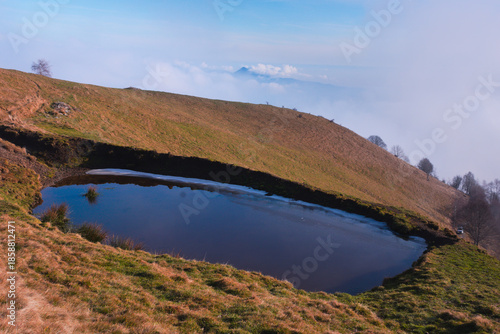 Alpine pond. Costa del Pallio, Brumano, Valle Imagna, Lombardy, Italy