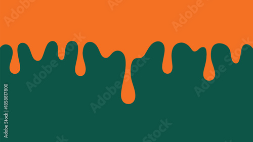 Vibrant orange liquid dripping over dark green background