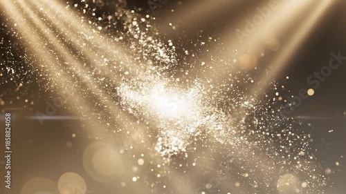 Glittering particles shine brightly in the spotlight, creating a dazzling display of light and texture