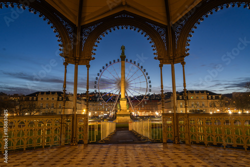 Ferris wheel and Jubilee Column at Schlossplatz Stuttgart at dusk
