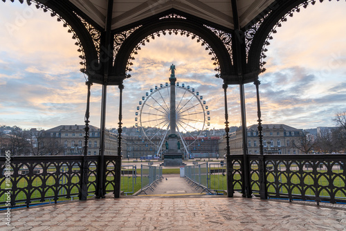 Ferris wheel and Jubilee Column at Schlossplatz Stuttgart at sunrise