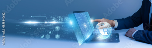 Vászonkép Businessman using laptop and analyze the data privacy protocols on digital interface