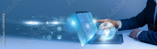 Businessman using laptop and analyze the business solutions data on digital interface. problem solving, enterprise strategy, technology innovation, digital services, corporate tools