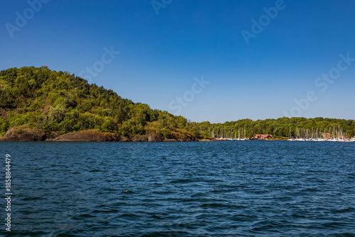 Small Rocky Island with Traditional Norwegian Houses in the Oslo Fjord