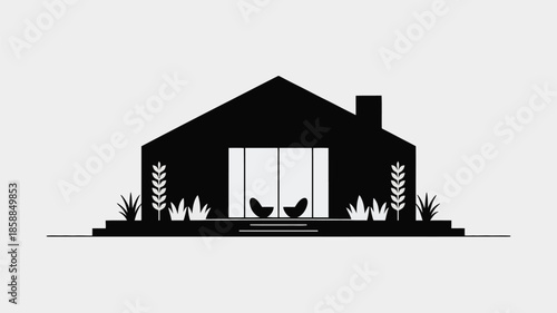 Minimalist black silhouette of a modern house with large doors.