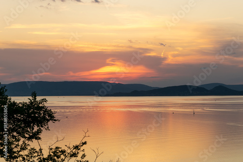 Beautiful sunset over Lake Balaton. Orange sky. Summer, Hungary.