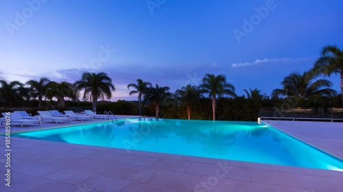 Wallpaper Mural Tropical poolside sunset transition from day to night with palm trees Torontodigital.ca