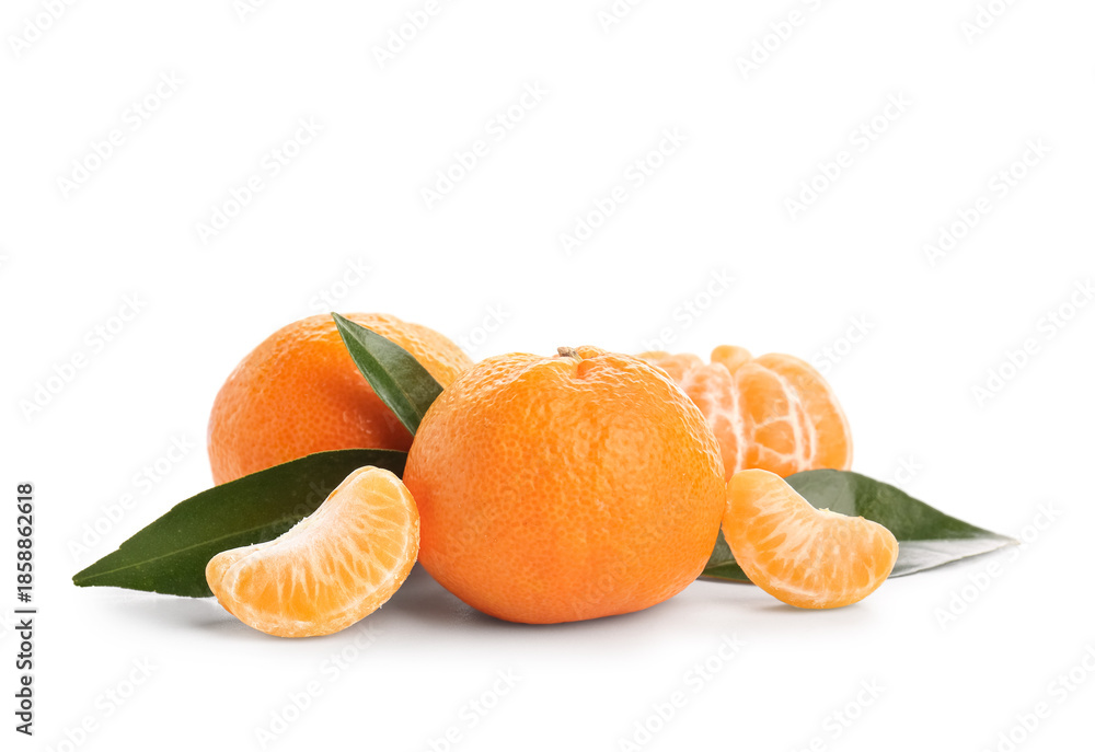 Fototapeta premium Sweet mandarins and leaves on white background
