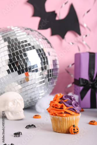 Tasty cupcake with disco ba...