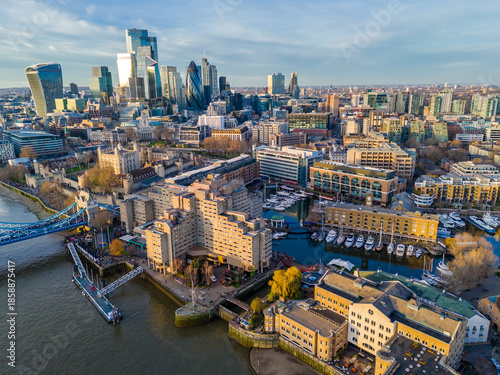 St Katharine Docks. Aerial drone view of Saintt Katharine Docks in London - historic marina, yachts and modern city architecture