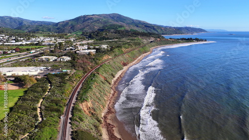 Fotografie Carpinteria Beach with Coastal Cliffs and Railroad California