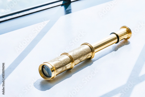 Wallpaper Mural a telescope on a table with a window in the background Torontodigital.ca