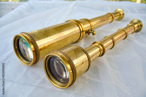 Wallpaper Mural two brass binoculars on a white sheet Torontodigital.ca