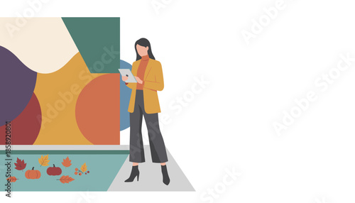 Professional woman uses tablet next to abstract art and floating pumpkins symbolizing autumn business technology