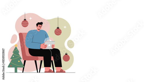 Stressed man works on tablet during Christmas isolated amidst holiday decorations