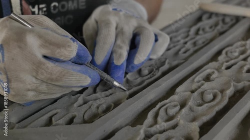 close up of man doing brick carving, xinchang county, shaoxing city. High quality 4k footage