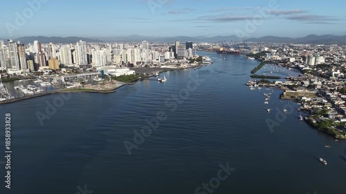 Channel that connects the Itajaí-Açu River to the Atlantic Ocean, where large ships arrive in Brazil in the city of Itajai, Santa Catarina. The video shows a ship docked in the port.