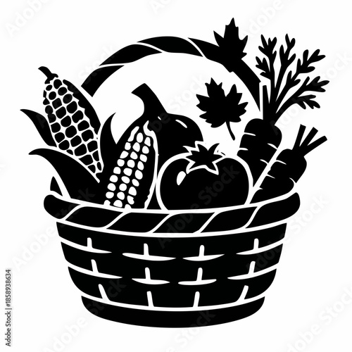 Black silhouette of harvest basket filled with vegetables, autumn gratitude theme