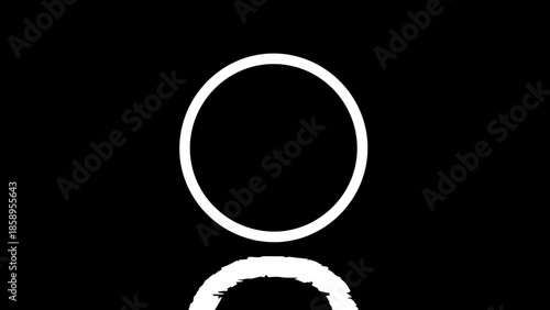 Glowing White Neon Ring in a Dark Moody Room with Reflections on the Concrete Floor
