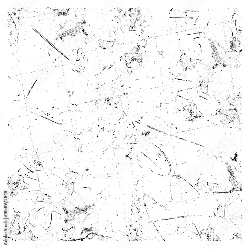 A high-contrast image of a textured surface with scattered debris and scratches