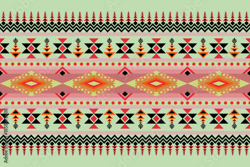 Seamless abstract geometric pattern with black ,red and orange color on light green background ,Native American tribal fabric, tile, carpet, vector, illustration design.Navajo pattern design.