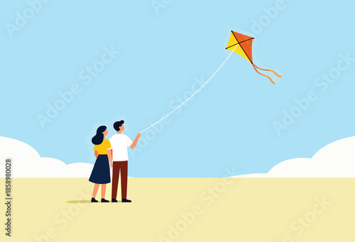 A couple enjoys a sunny day flying a colorful kite over a sandy landscape