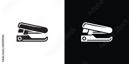 Black and white stapler on contrasting backgrounds