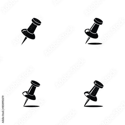 Four black push pins with loops on white background