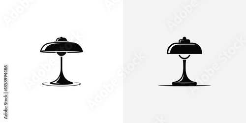 Two Black Table Lamps with Round Shades and Stands