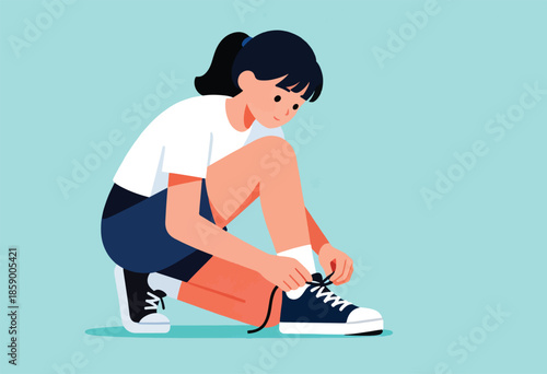 Young person crouching to tie shoelaces on a sneaker