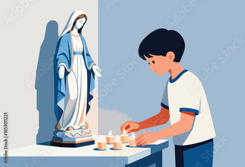 Boy lights candles before statue of Mother Mary