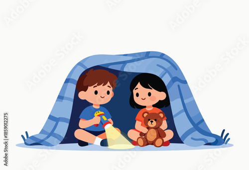 Two children under a blanket fort with a flashlight and teddy bear