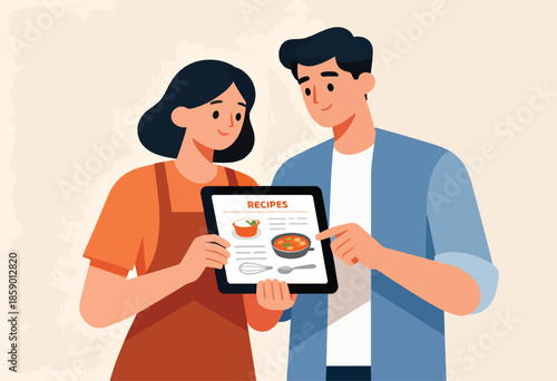 A couple looks at a tablet displaying recipes and kitchen utensils