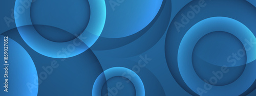 This abstract image shows overlapping translucent circles in shades of blue
