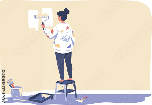Woman painting a wall with a roller and paint tray on a step stool