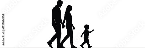 Silhouette of a happy family walking together outdoors