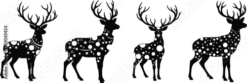 Set of four graphic reindeer silhouettes with starry, celestial patterns