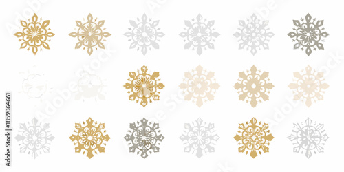An assortment of delicate snowflakes in varying shades of gold and silver
