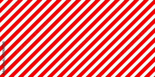 A striking pattern of diagonal red and white stripes fills the entire frame