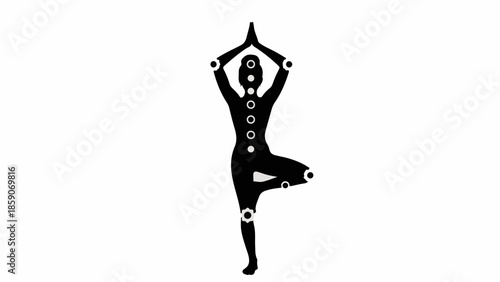 Silhouette of a person in tree pose with chakras aligned, promoting balance and inner peace.