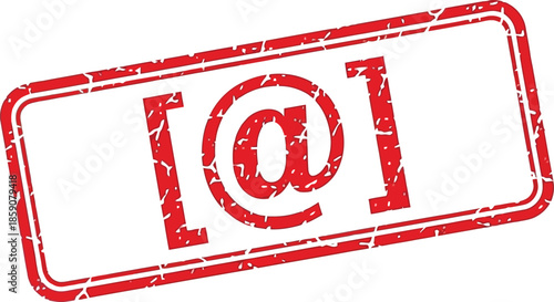 A detailed view of a red rectangular rubber stamp displaying the at symbol within square brackets