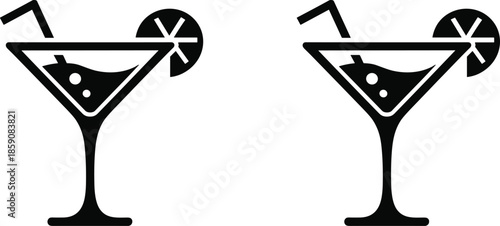 Two Black and White Cocktail Glasses with Lemon Slices and Straws 1