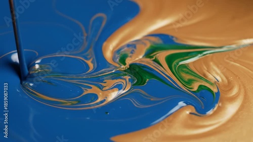 A visually pleasing abstract flow of deep azure and soft amber liquid paints blending together in perfect slow motion harmony fluid movement, corporate video, visual