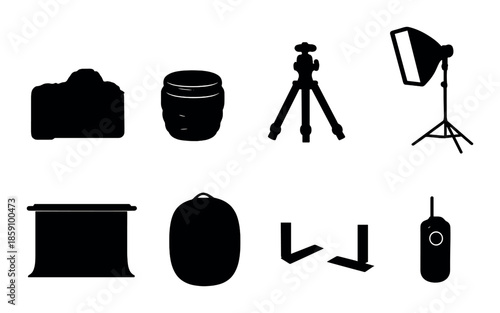 Silhouettes of photography equipment on dark background