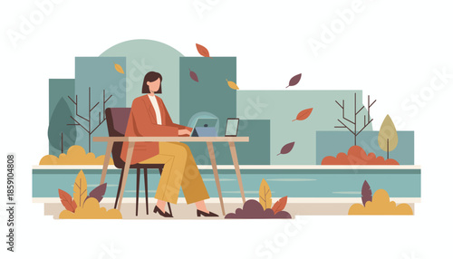Woman working remotely on a tablet outdoors in an autumnal park setting combining business and nature