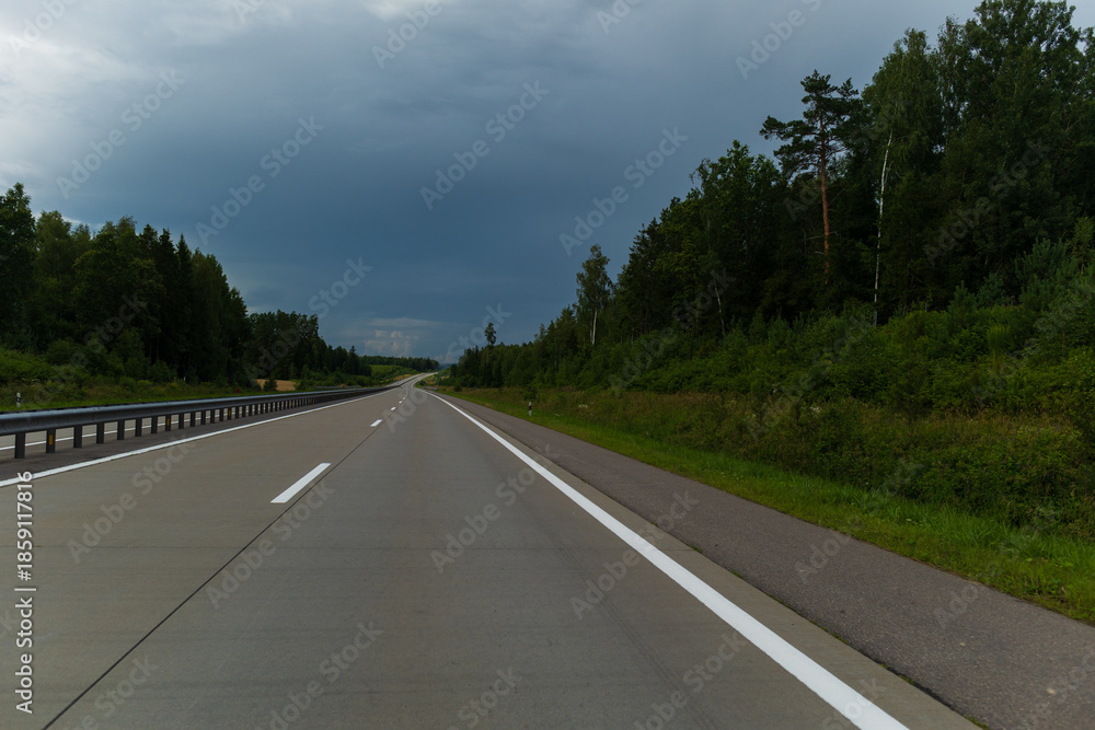 Fototapeta premium Bad weather, views of the road highway, clouds and darkness.