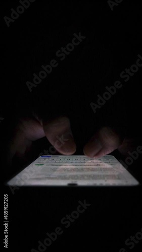 Night, cybersecurity and hands typing with phone for texting, internet troll or person cyberbullying. Dark comment, social media netizen or keyboard warrior, online bullying or hacking. vertical.